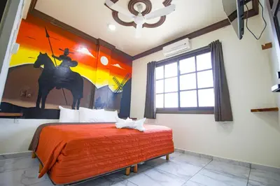 Cama o camas de una habitación en Hotel Diamante