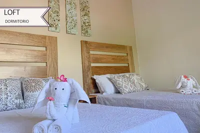 Cama o camas de una habitación en Condominios JAROJE Huatulco
