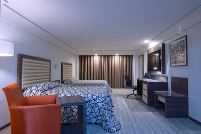 Cama o camas de una habitación en Econo Express Hotel
