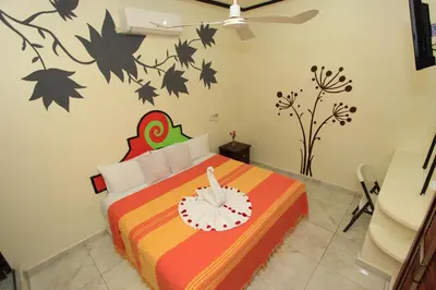 Cama o camas de una habitación en Hotel Posada Diamante