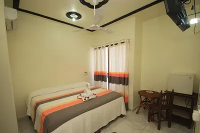 Cama o camas de una habitación en Hotel Posada Diamante