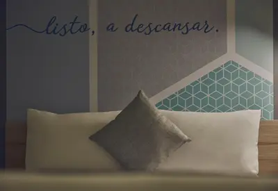 Cama o camas de una habitación en One Acapulco Diamante