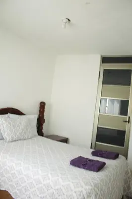 Cama o camas de una habitación en Hotel Posada Sernichari