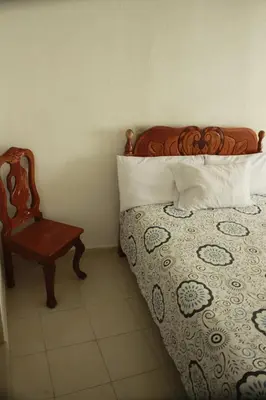 Cama o camas de una habitación en Hotel Posada Sernichari