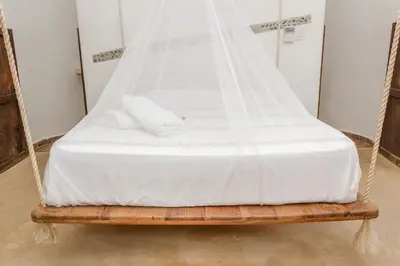 Cama o camas de una habitación en Cabañas Biuzaa