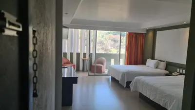 Cama o camas de una habitación en Hotel Borda Cuernavaca