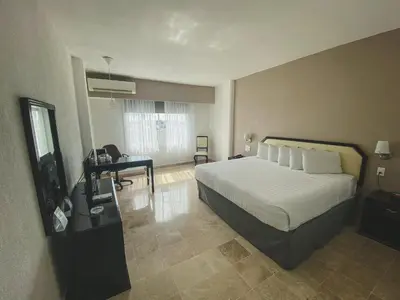 Cama o camas de una habitación en Days Inn by Wyndham Tuxtepec