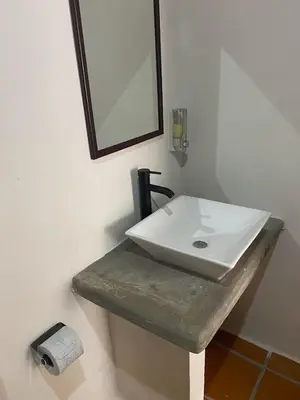 Un baño de Hotel y Bungalows Acuario