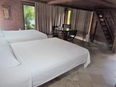 Cama o camas de una habitación en Hotel Casa de Lirio Diamante