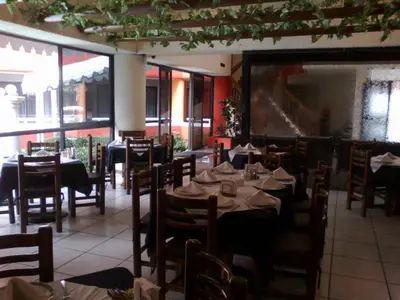 Un restaurante o sitio para comer en Hotel Real del Sol