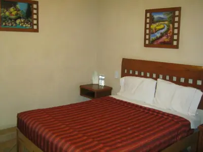 Cama o camas de una habitación en Hotel Real Santa María