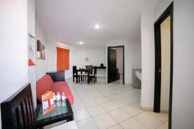 Zona de estar de Hotel RS Suites