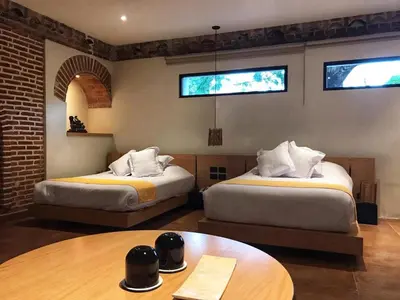 Cama o camas de una habitación en Hotel Boutique Casa Fernanda