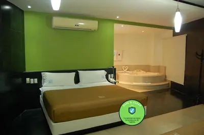 Cama o camas de una habitación en Hotel Porto Novo