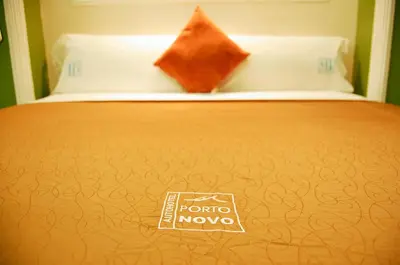 Cama o camas de una habitación en Hotel Porto Novo
