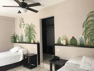 Cama o camas de una habitación en Hotel Calli Quetzalcoatl