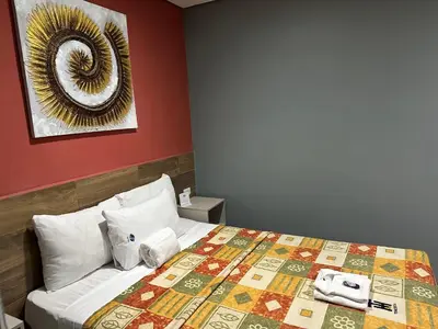 Cama o camas de una habitación en Hotel Teresita