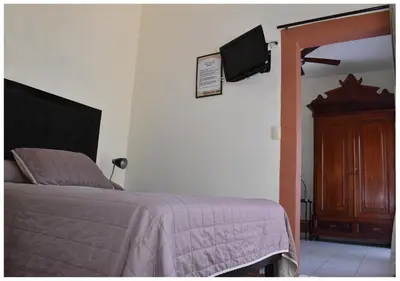Cama o camas de una habitación en Posada Galeria Alberto Sedas