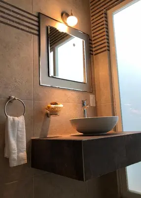 Un baño de Hotel SKY & PALMS