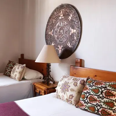 Cama o camas de una habitación en Hotel los Arcos