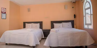 Cama o camas de una habitación en Hotel Express Alejandría