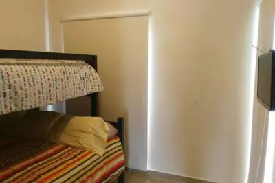 Cama o camas de una habitación en Casa con alberca y laguna
