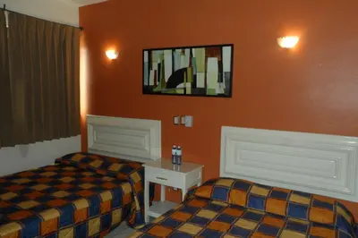Cama o camas de una habitación en Hotel Fernando