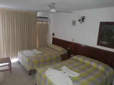 Cama o camas de una habitación en Hotel Maria Luisa