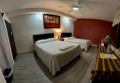 Cama o camas de una habitación en Hotel Makarios