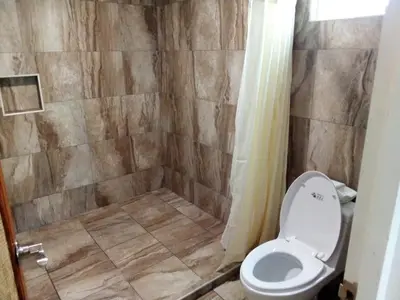 Un baño de Hotel Palapa Palace