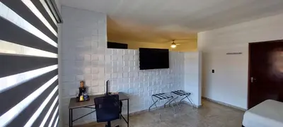 Una televisión o centro de entretenimiento en Hotel Palmareca