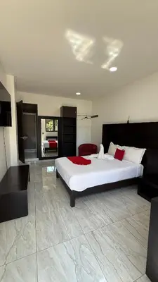 Cama o camas de una habitación en Hotel Villa Pralaya