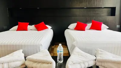 Cama o camas de una habitación en Hotel Villa Pralaya