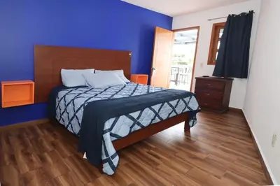 Cama o camas de una habitación en Hotel Casa Frida