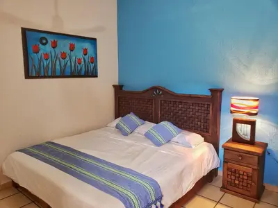 Cama o camas de una habitación en Casa de Huespedes Cielito Lindo
