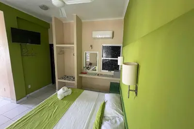 Una televisión o centro de entretenimiento en Casa Mia
