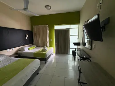 Una televisión o centro de entretenimiento en Casa Mia