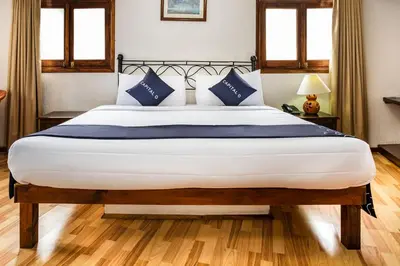 Cama o camas de una habitación en Capital O Hotel Central, Xalapa