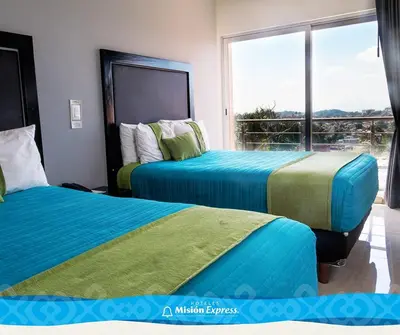 Cama o camas de una habitación en Hotel Misión Express Xalapa