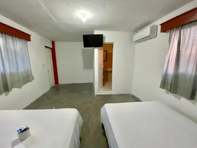 Cama o camas de una habitación en Hotel Maria Bonita Acapulco