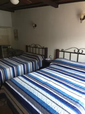 Cama o camas de una habitación en Hotel Uke Inn Terán