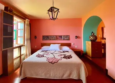 Cama o camas de una habitación en Hotel Las Golondrinas
