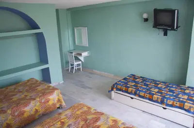 Cama o camas de una habitación en Dorados Acapulco