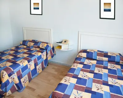 Cama o camas de una habitación en Dorados Acapulco