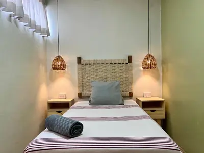 Cama o camas de una habitación en Hostal Central Oaxaca