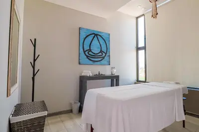 Cama o camas de una habitación en Arkana Puebla by Grupo Amber