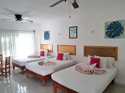 Cama o camas de una habitación en Hotel Quinta Paraiso