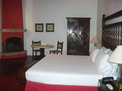 Cama o camas de una habitación en Hotel Casa Colonial - Adults Only