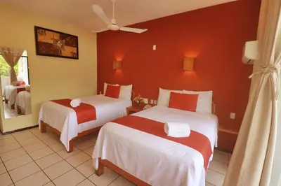 Cama o camas de una habitación en Surf Olas Altas