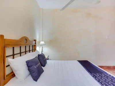 Cama o camas de una habitación en Hotel Valle De Oaxaca